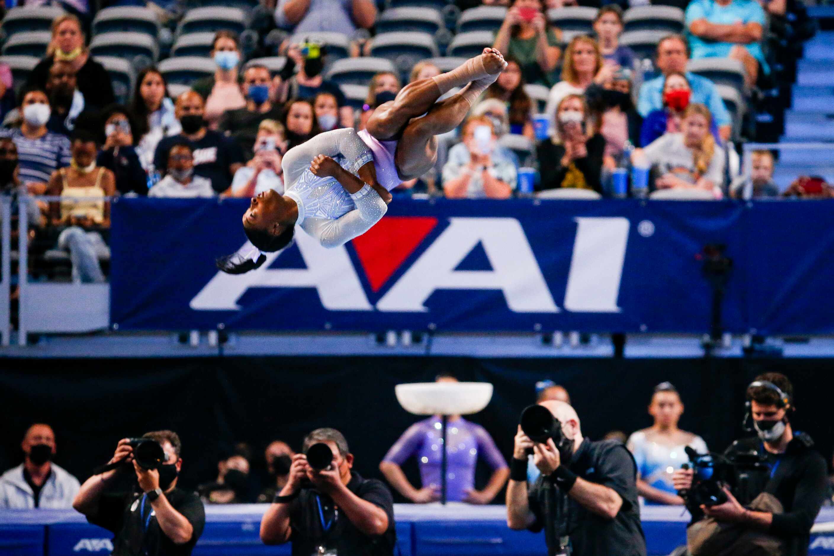 Simone Biles performs on the floor during day 1 of the senior women's US gymnastics...