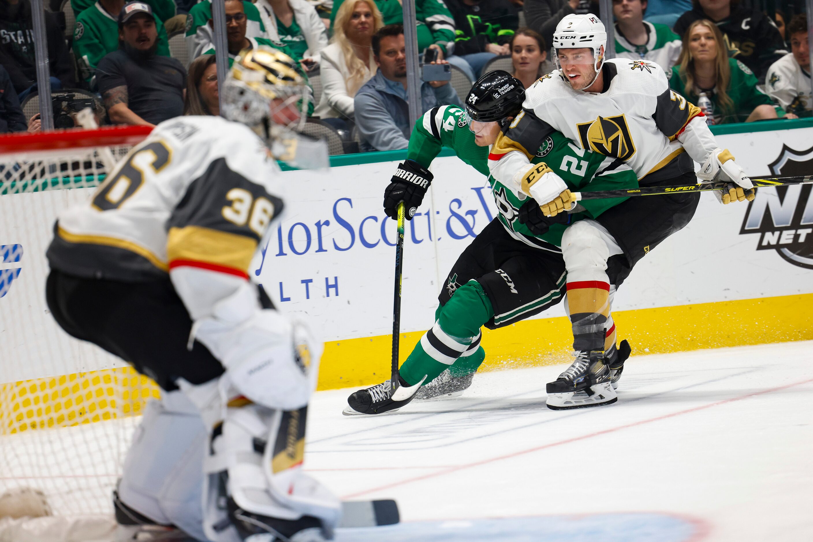 Dallas Stars center Roope Hintz (24) collides into Vegas Golden Knights defenseman Brayden...