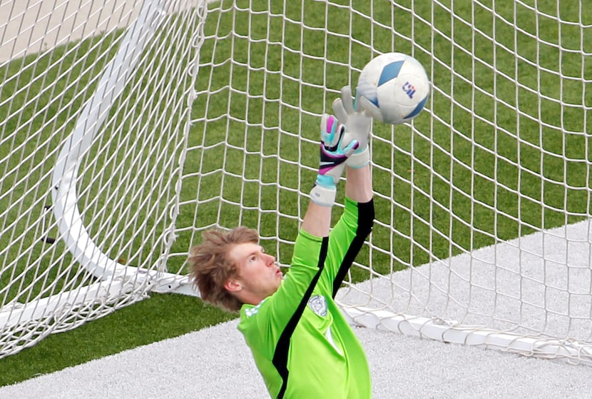 Flower Mound goalkeeper Morgan English (1), leaps to make a save during first half action in...