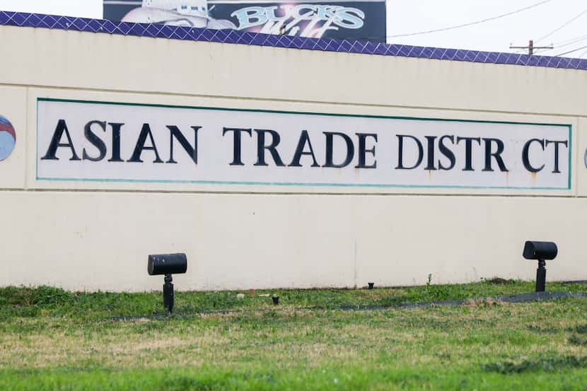 The Asian Trade District signs in Dallas, one of which is missing a letter, were envisioned...