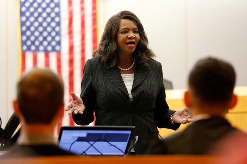 Dallas district attorney Faith Johnson speaks to the five graduates during the inaugural...