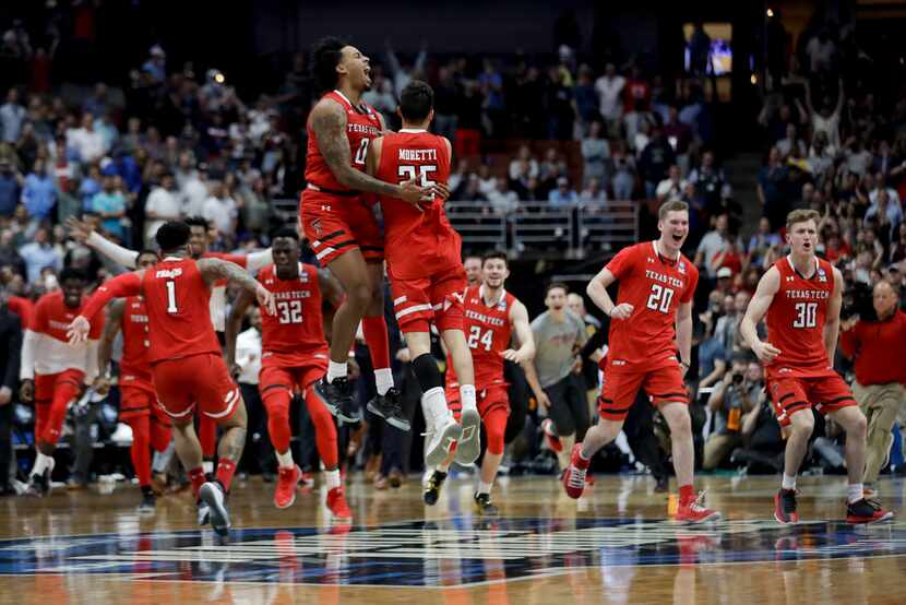 Texas Tech celebrates after a 75-69 win against Gonzaga in the West Regional final in the...