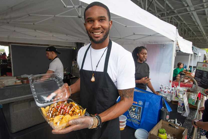 Brandon Waller, owner of Bam’s Vegan, at his food stand in Dallas Farmers Market on June 2,...