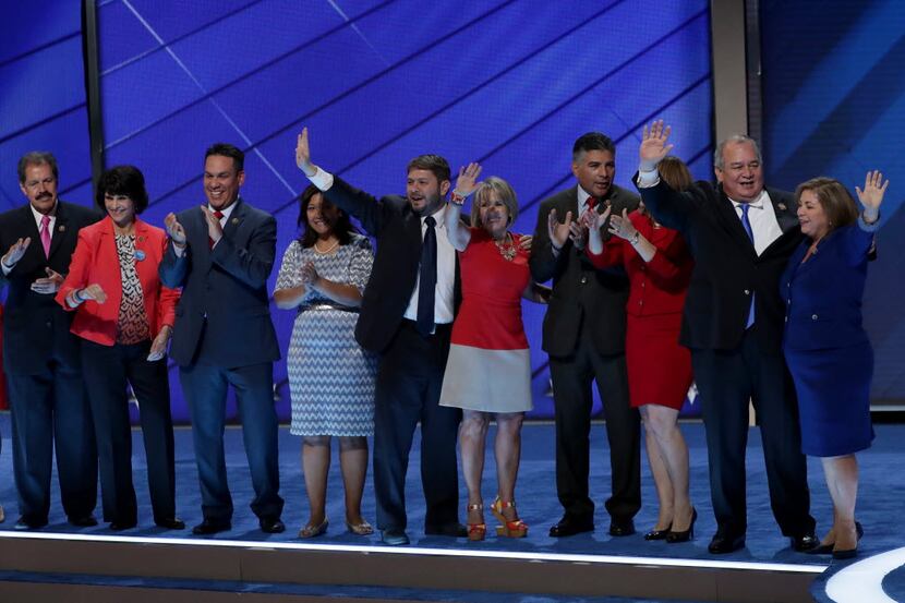 Rep. Linda Sanchez (far right) stands with members of the Congressional Hispanic Caucus...