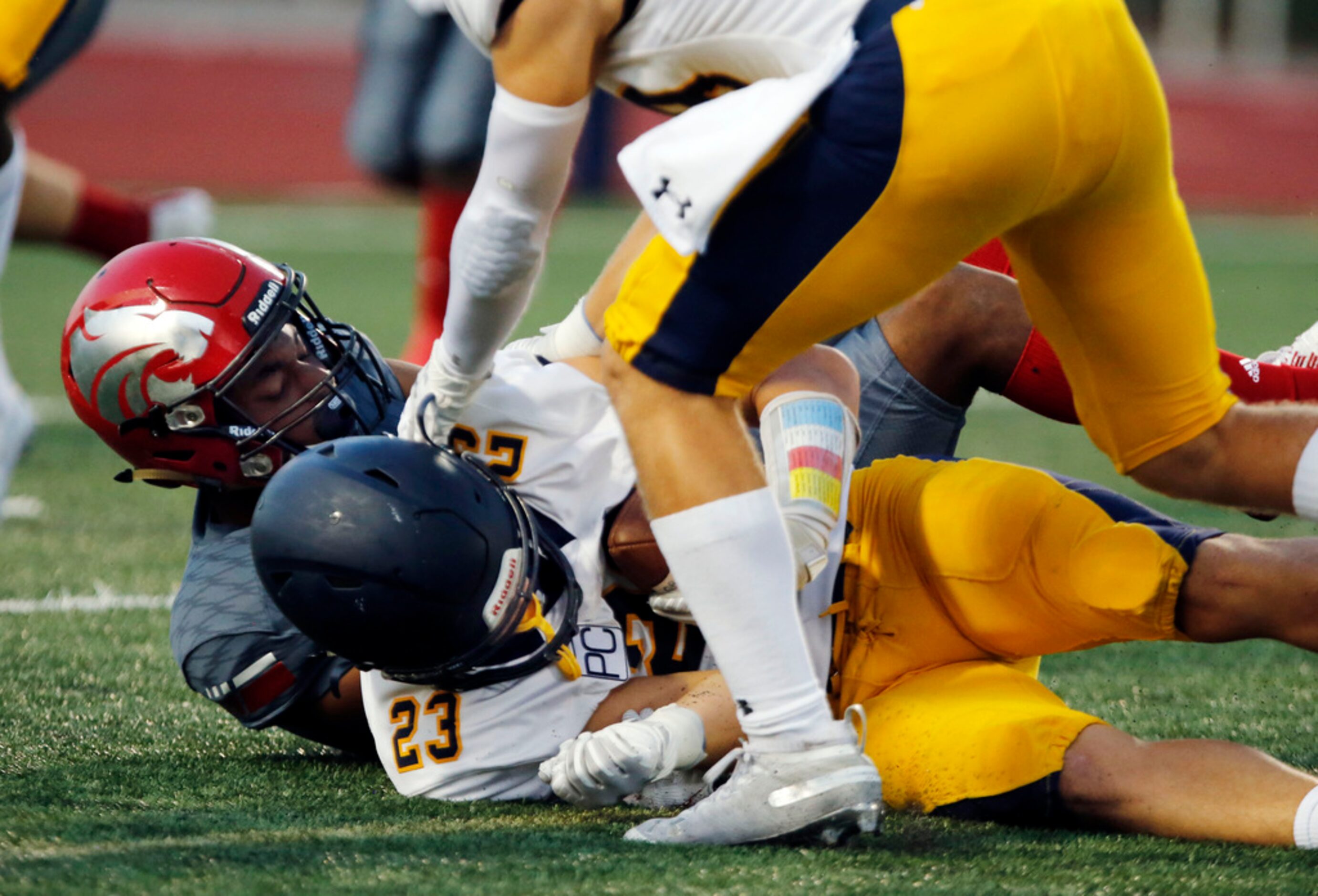 Highland Park's defender Andrew Bonnet (23) comes up with a turnover during the first half...