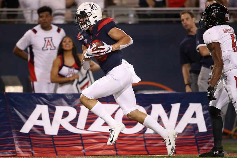 Wide receiver Cedric Peterson of the Arizona Wildcats catches a 47-yard reception against...