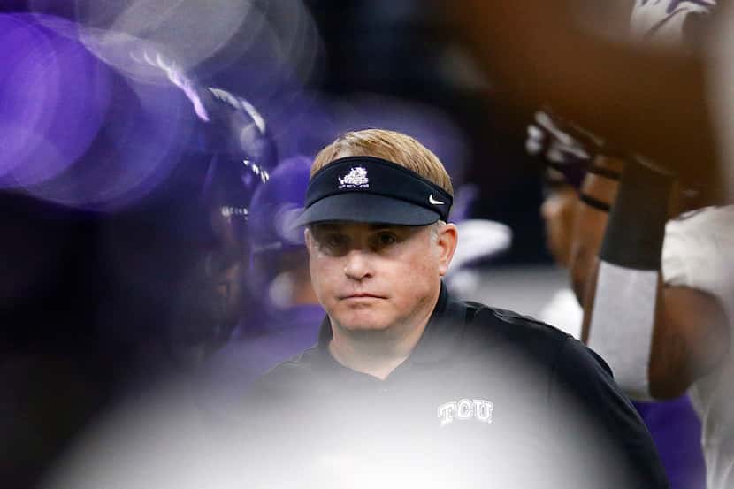 TCU Horned Frogs head coach Gary Patterson watches his team warm up before facing the...