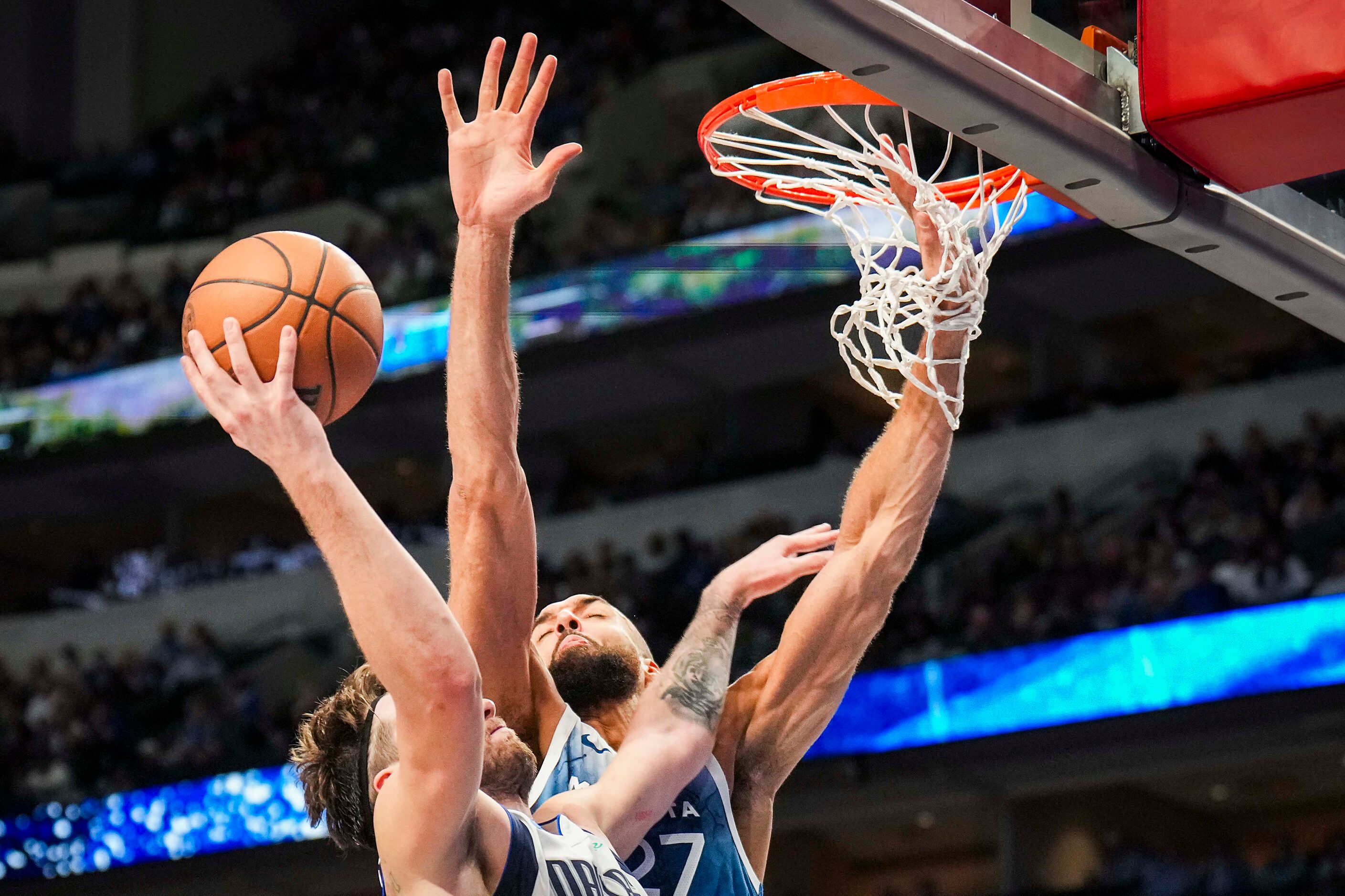 Dallas Mavericks guard Luka Doncic (77) drives to the basket against Minnesota Timberwolves...