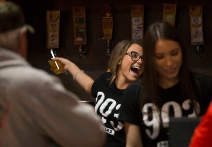 Bartender Caitlin O'Malley pours Down with the PastryArchy cream ale made with cinnamon...