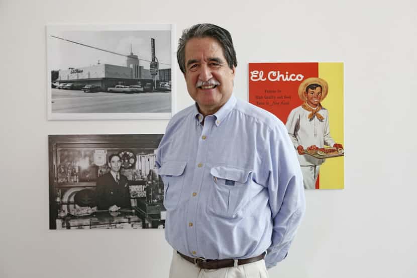 John Cuellar poses with a photo of his father -- and the Oak Cliff El Chico that would...