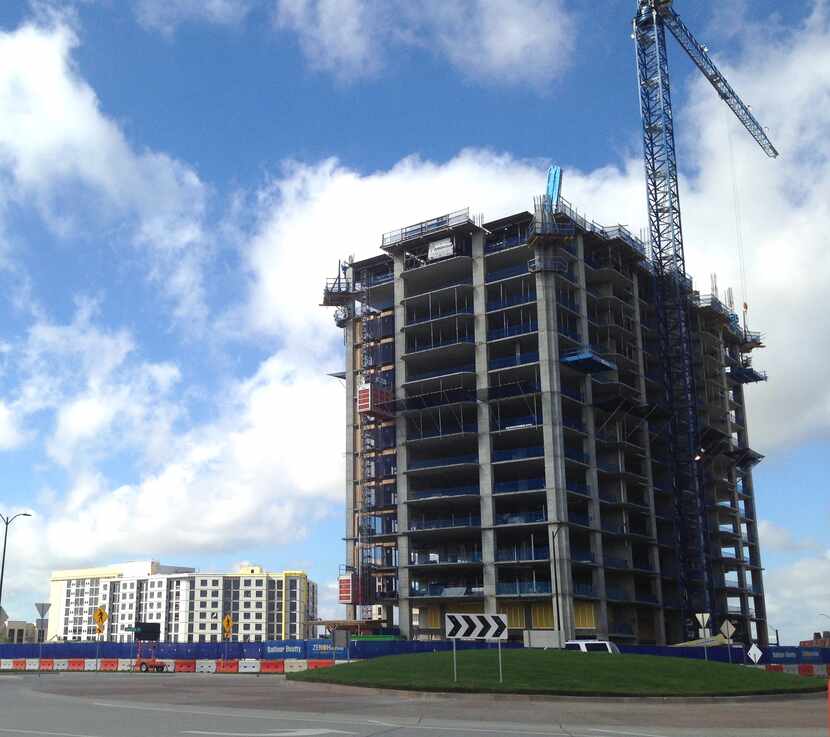 An apartment tower and two hotels are still under construction n Frisco Station.