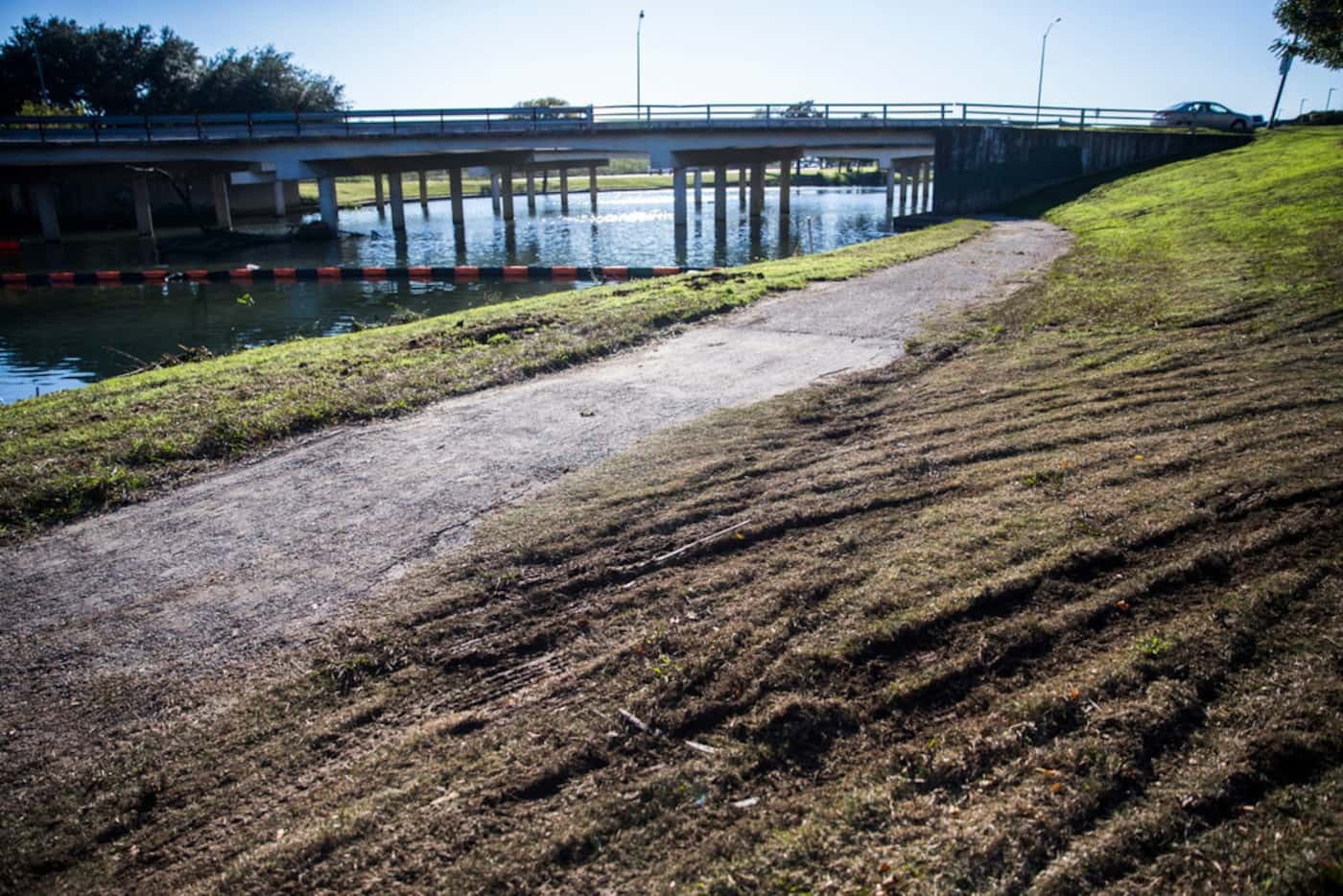 A trial winds under Lemmon Avenue at Bachman Lake Greenbelt at the corner of Lemmon Avenue...