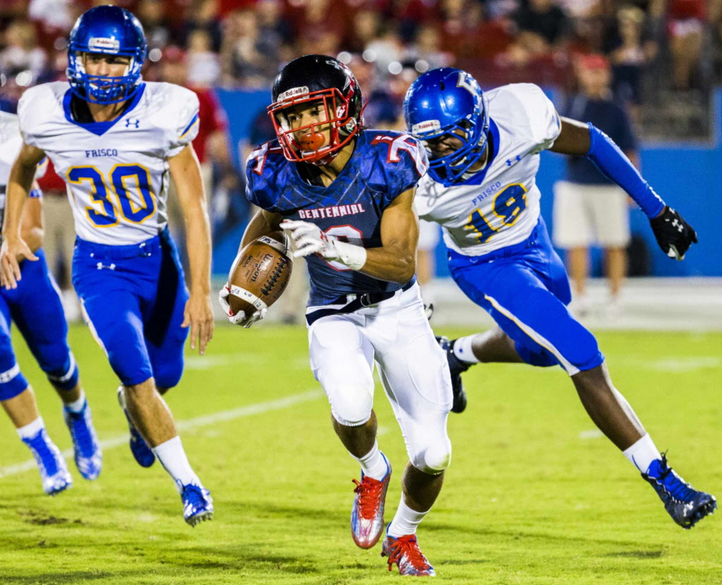 Frisco Centennial wide receiver Raleigh Texada (9) runs the ball in front of Frisco...