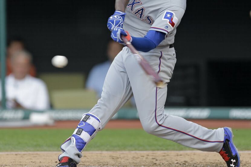 Texas Rangers' Jurickson Profar hits a solo home run off Cleveland Indians starting pitcher...