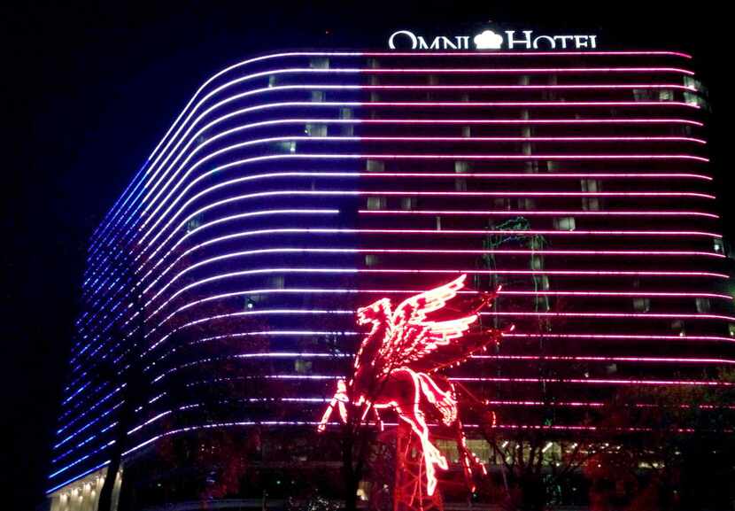  The Omni Dallas hotel's facades were adorned in blue, white and red in reference to...