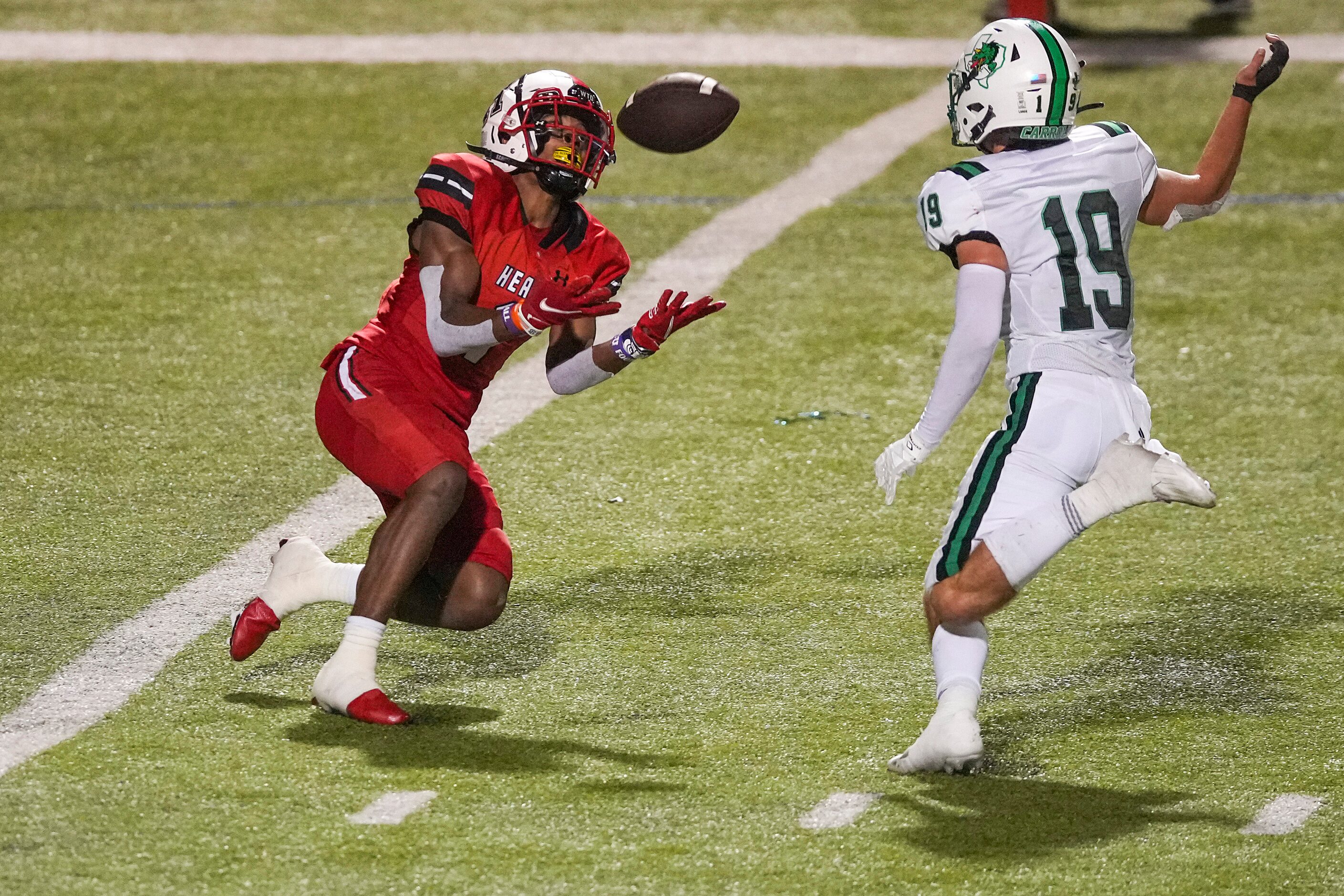 Rockwall-Heath wide receiver Jay Fair (1) catches a 36-yard touchdown pass as Southlake...