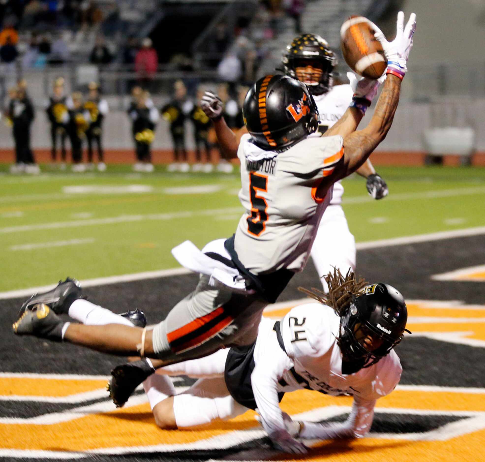 Lancaster wide receiver Majik Rector (5) lays out for an attempted touchdown catch against...