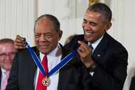 Baseball Hall of Famer Willie Mays (left) receives the Presidential Medal of Freedom from...