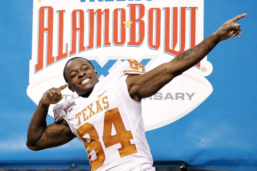 Texas Longhorns wide receiver Marquise Goodwin (84) celebrates as he is about to receive the...