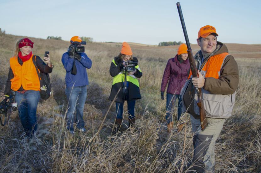 Cameras followed Cruz during a hunt hosted by Rep. Steve King, R-Iowa, in Akron, Iowa. Some...