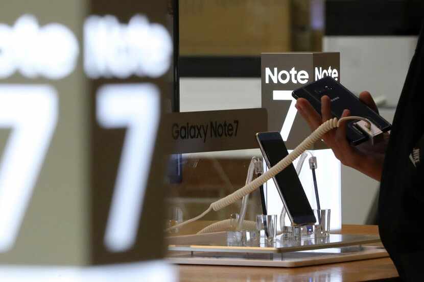 A visitor tries out a Samsung Electronics Galaxy Note 7 smartphone in Seoul. (File Photo/The...