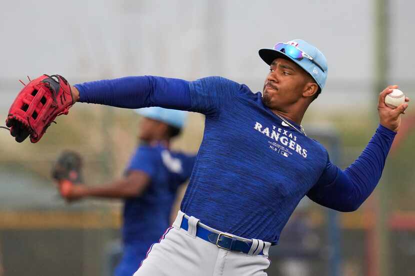 Texas Rangers minor league outfielder Yeison Morrobel participates in a spring training...