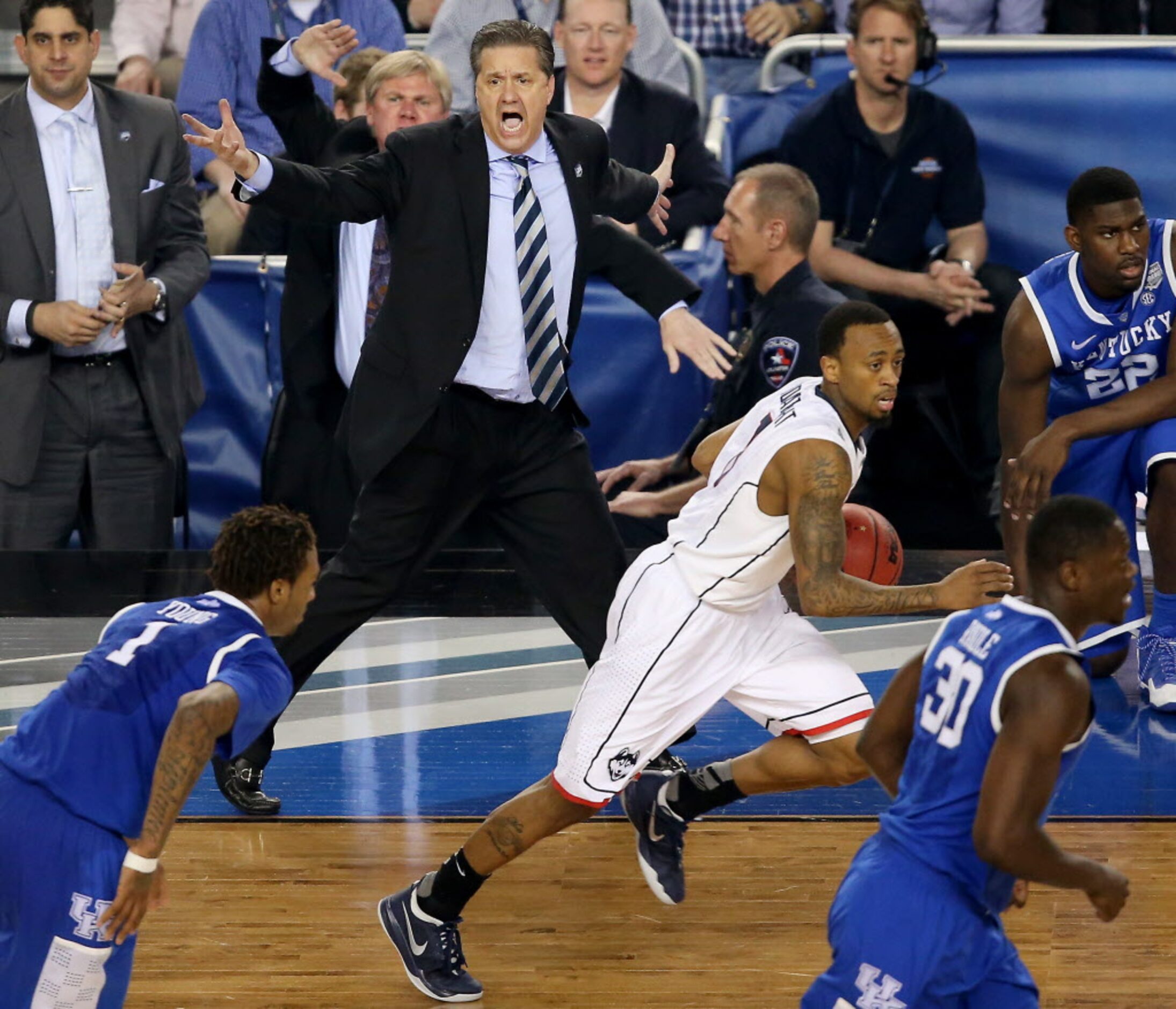 Kentucky Wildcats head coach John Calipari reacts to a no call against the Connecticut...