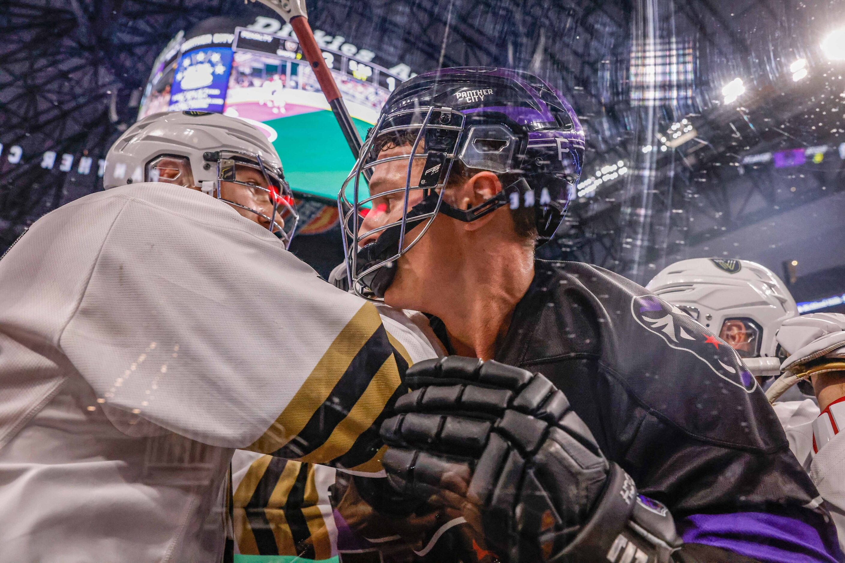 Panther City Patrick Dodds (15) gets pushed against the wall by Vancouver Warriors Derek...