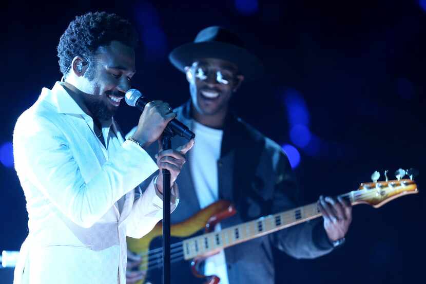 Childish Gambino, left, performs "Terrified" at the 60th annual Grammy Awards at Madison...