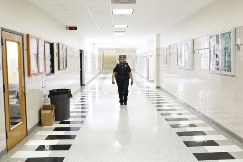 Richardson Police Officer and School Resource Officer La'Evening Woodard patrols the halls...