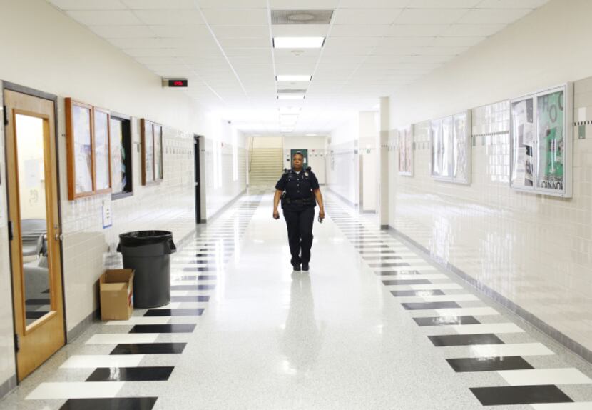 Richardson Police Officer and School Resource Officer La'Evening Woodard patrols the halls...