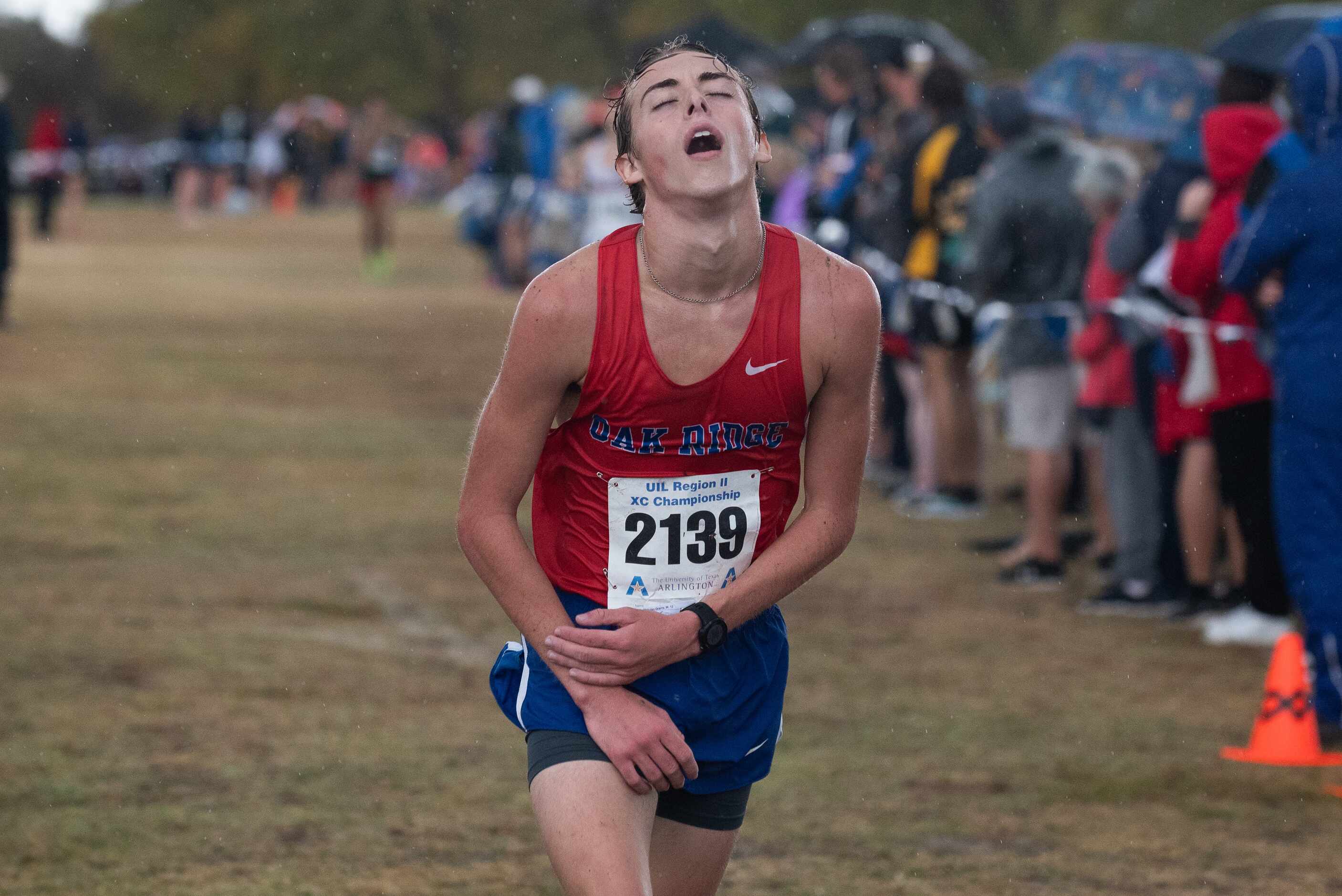 Conroe Oak Ridge runner Nicholas Grams finishes second as he crosses the finish line...