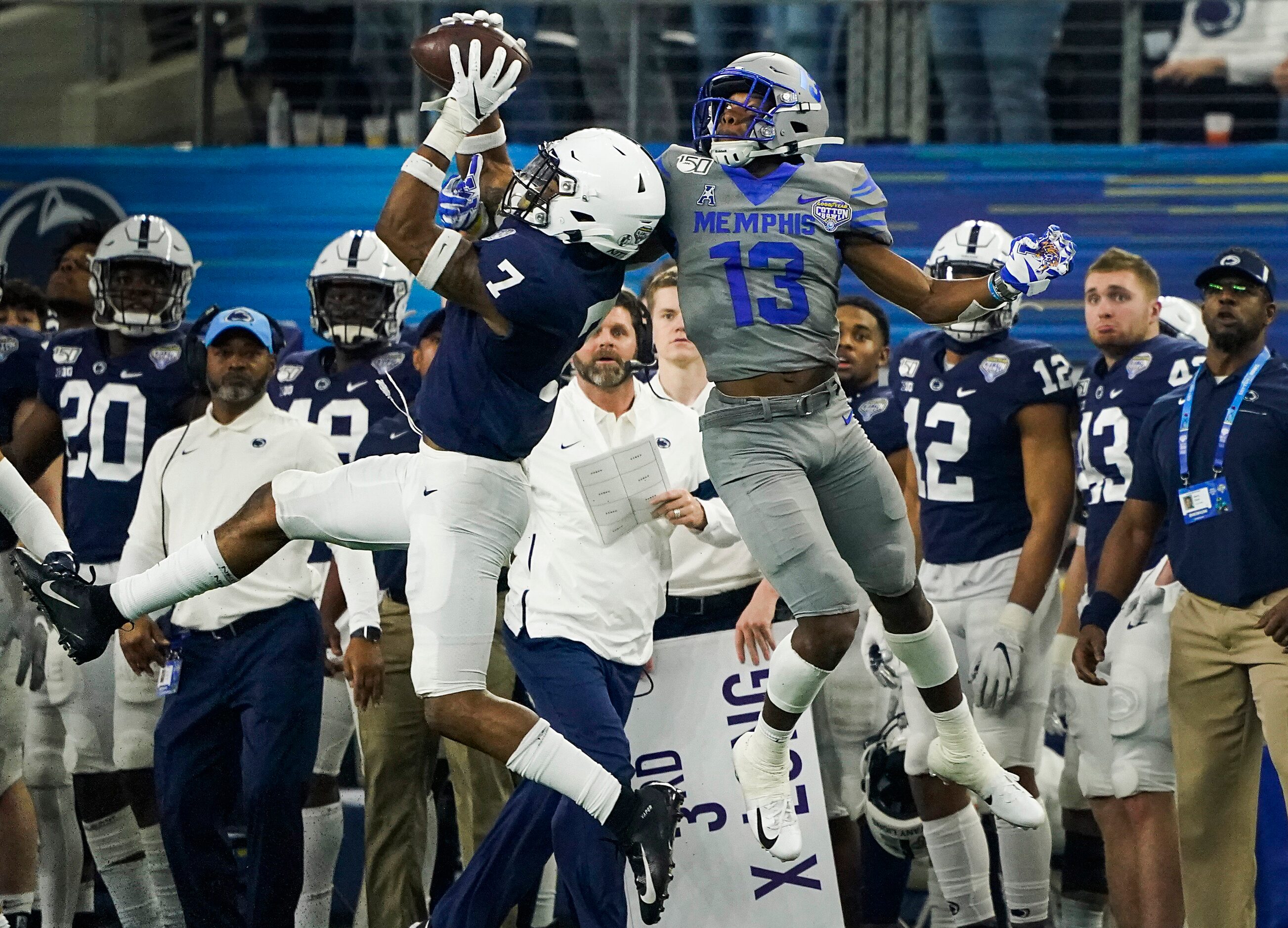 Penn State safety Jaquan Brisker (7) grabs a pass intended for Memphis wide receiver...