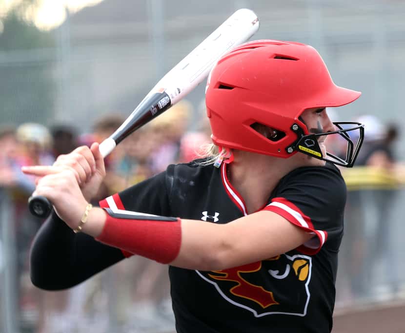 Melissa shortstop Caigan Crabtree (0) bats in the bottom of the 2nd inning of play against...