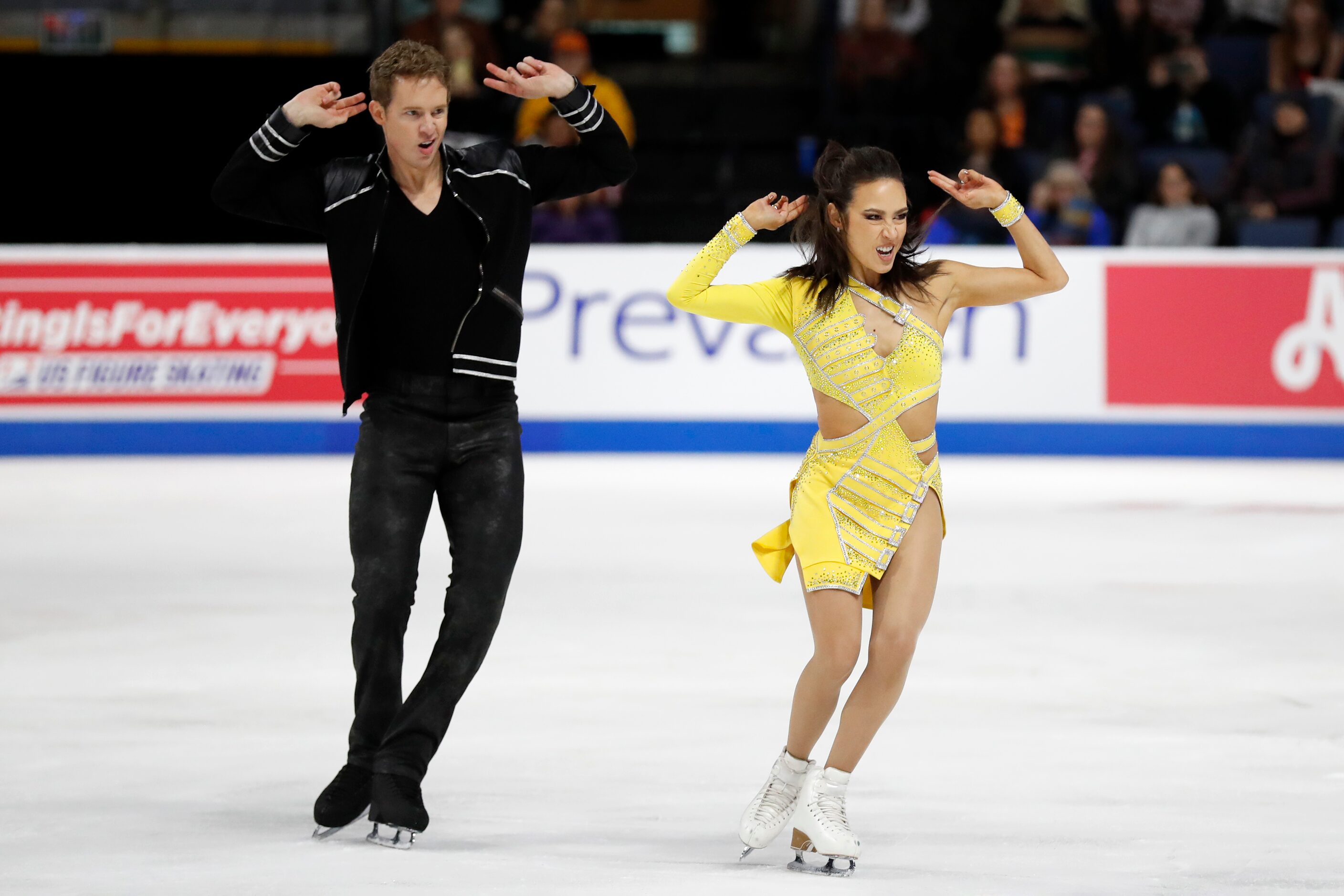 Madison Chock, right, and Evan Bates, of the United States, compete in the ice dance rhythm...