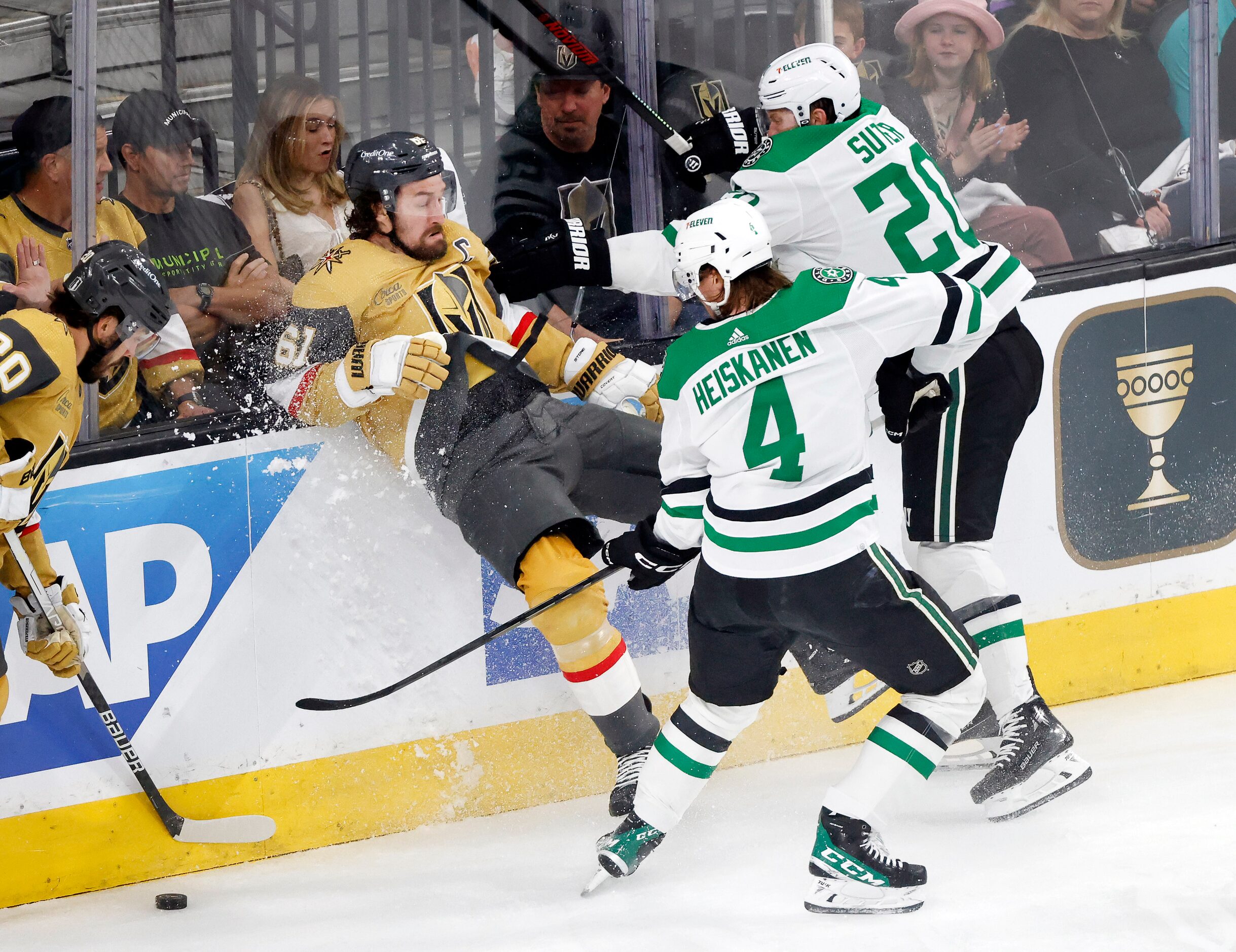 Dallas Stars defenseman Ryan Suter (20) slams Vegas Golden Knights center Chandler...