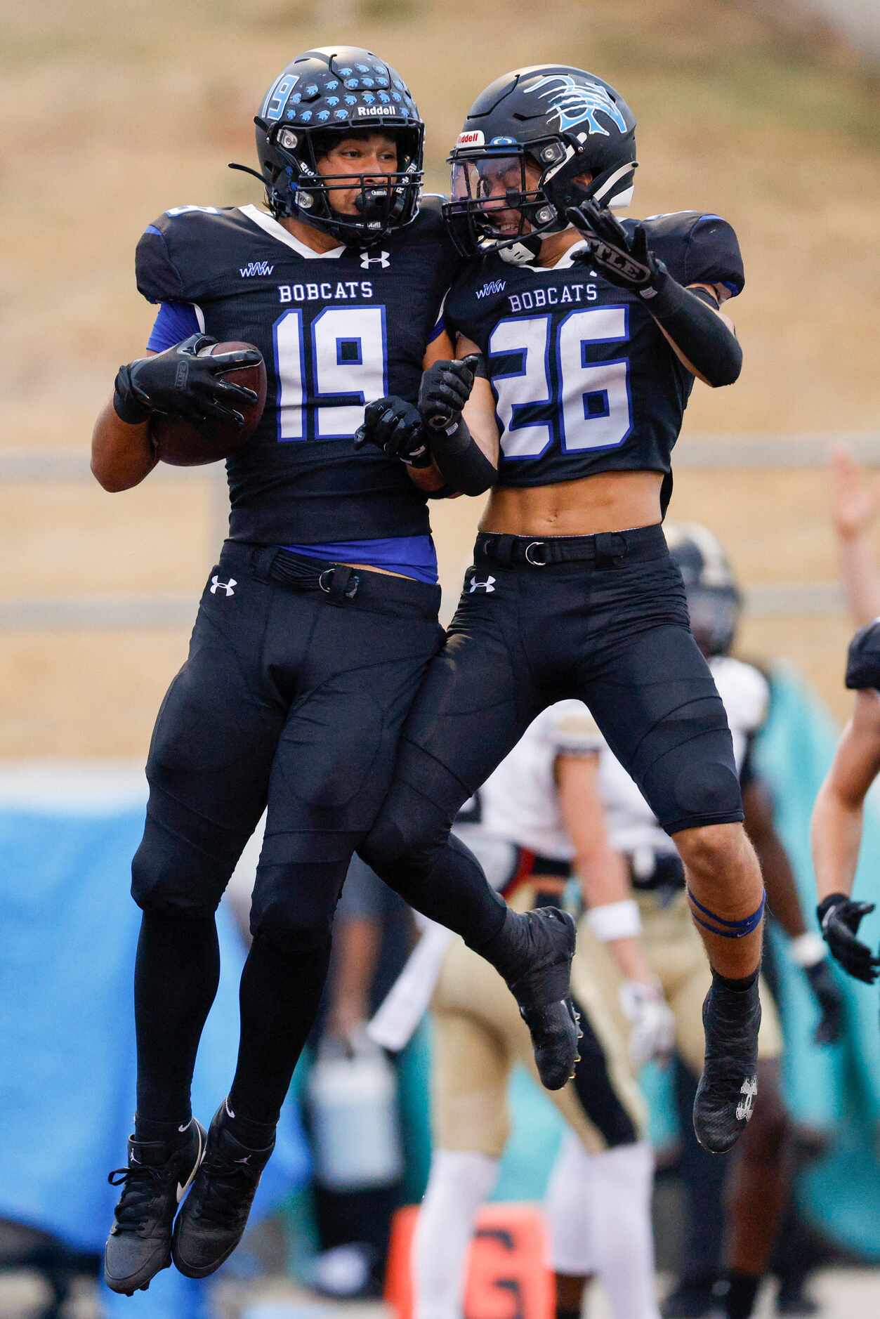 Trophy Club Byron Nelson wide receiver Parker Almanza (19) celebrates his touchdown with...