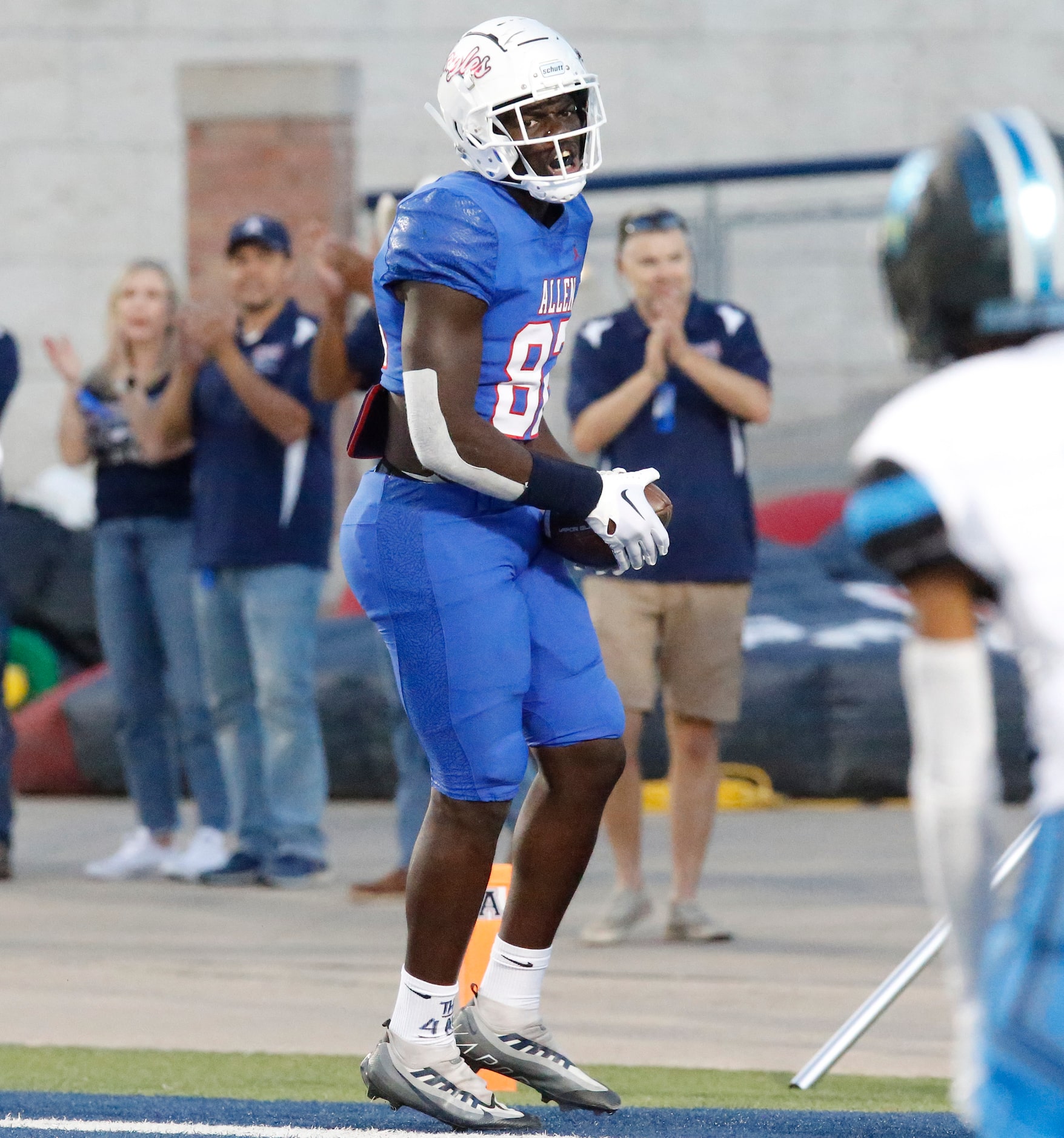 Allen High School wide receiver Quinton Hammonds (82) reacts to catching a touchdown pass on...