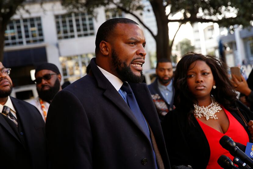 Civil rights lawyer Lee Merritt, shown addressing the news media outside Fort Worth City...