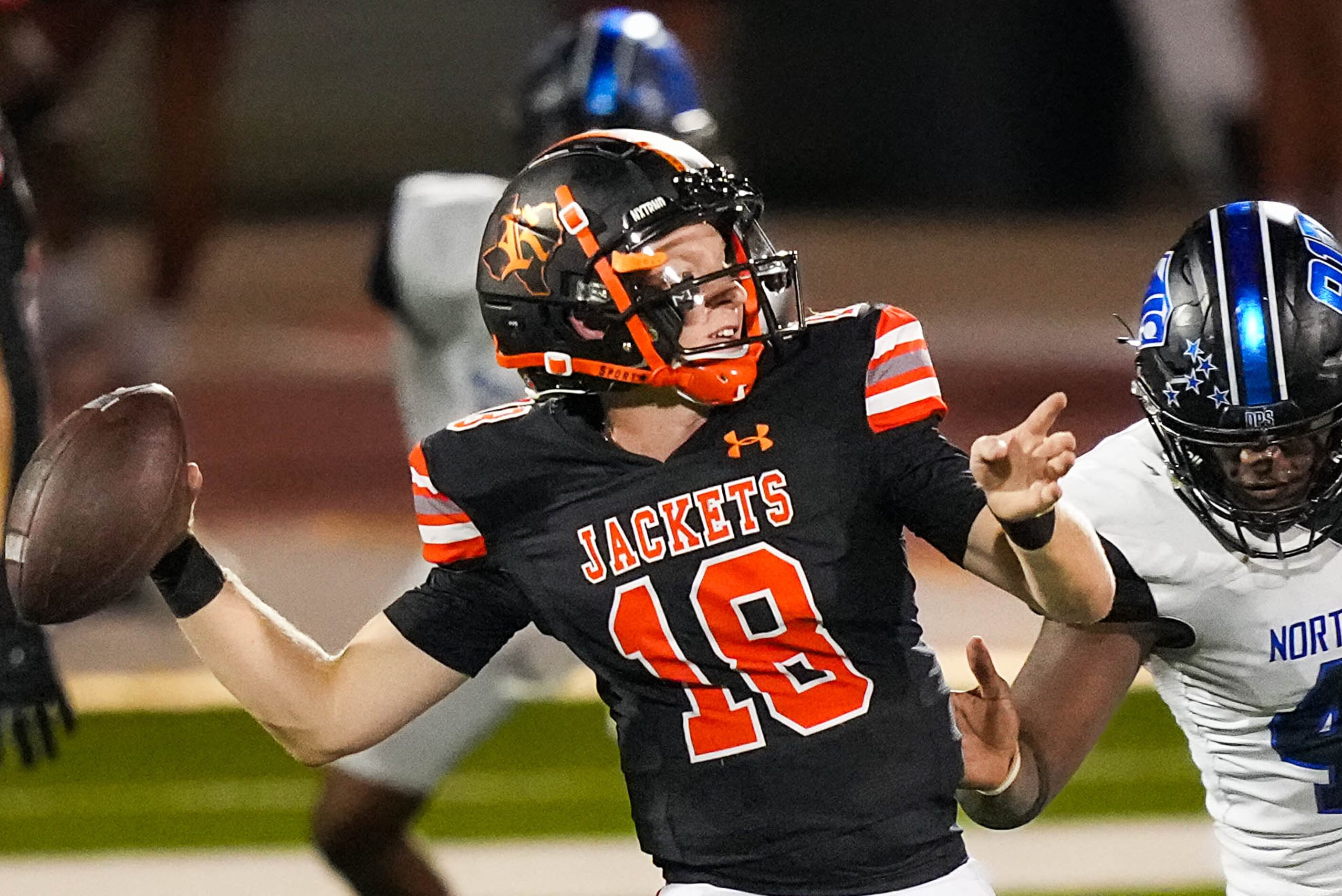 Rockwall quarterback Brent Rickert (18) throws a pass during the second half of a high...