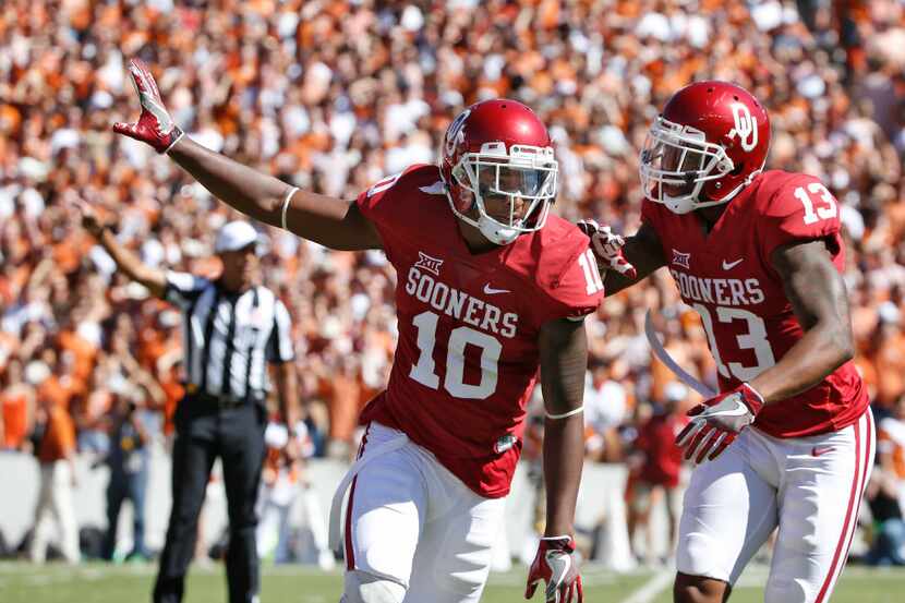Oklahoma Sooners safety Steven Parker (10) celebrates a recovered fumble against Texas...