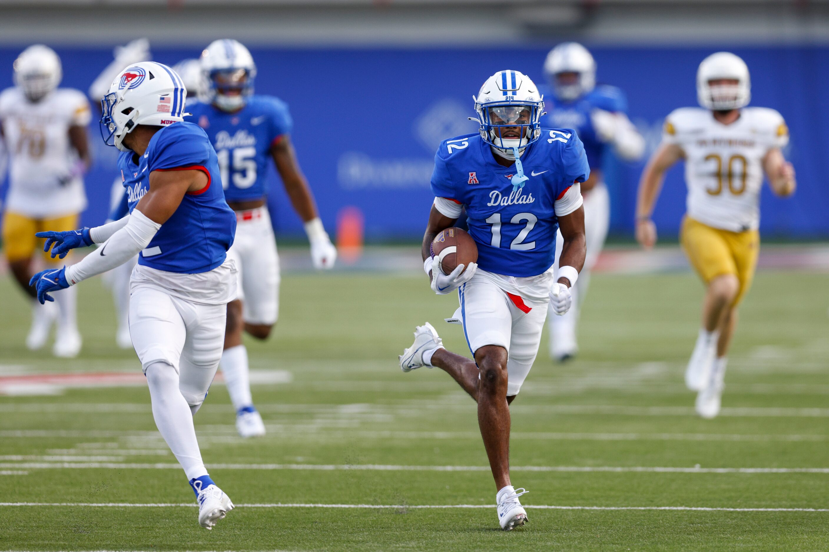 SMU cornerback Chris Megginson (12) returns a blocked field goal for a touchdown during the...