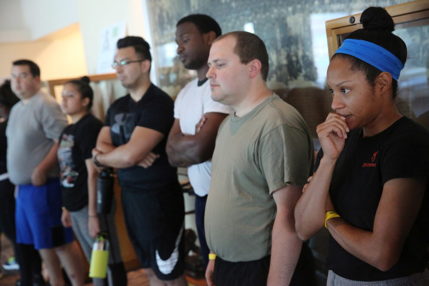 Amanda Martin waits her turn during on-site testing at Dallas police headquarters.