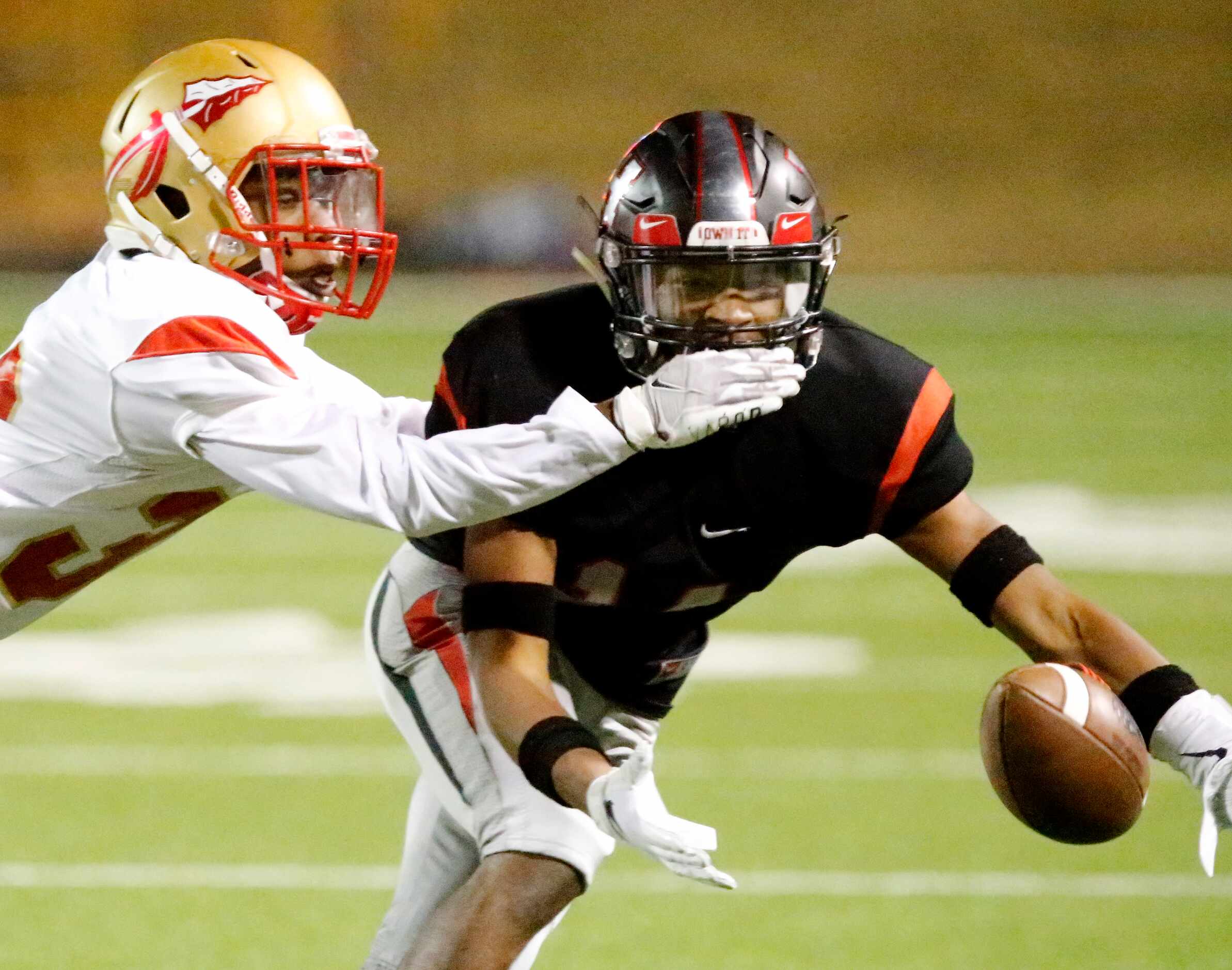 South Grand Prairie High School strong safety Jaden Robinson (3) breaks up a pass intended...