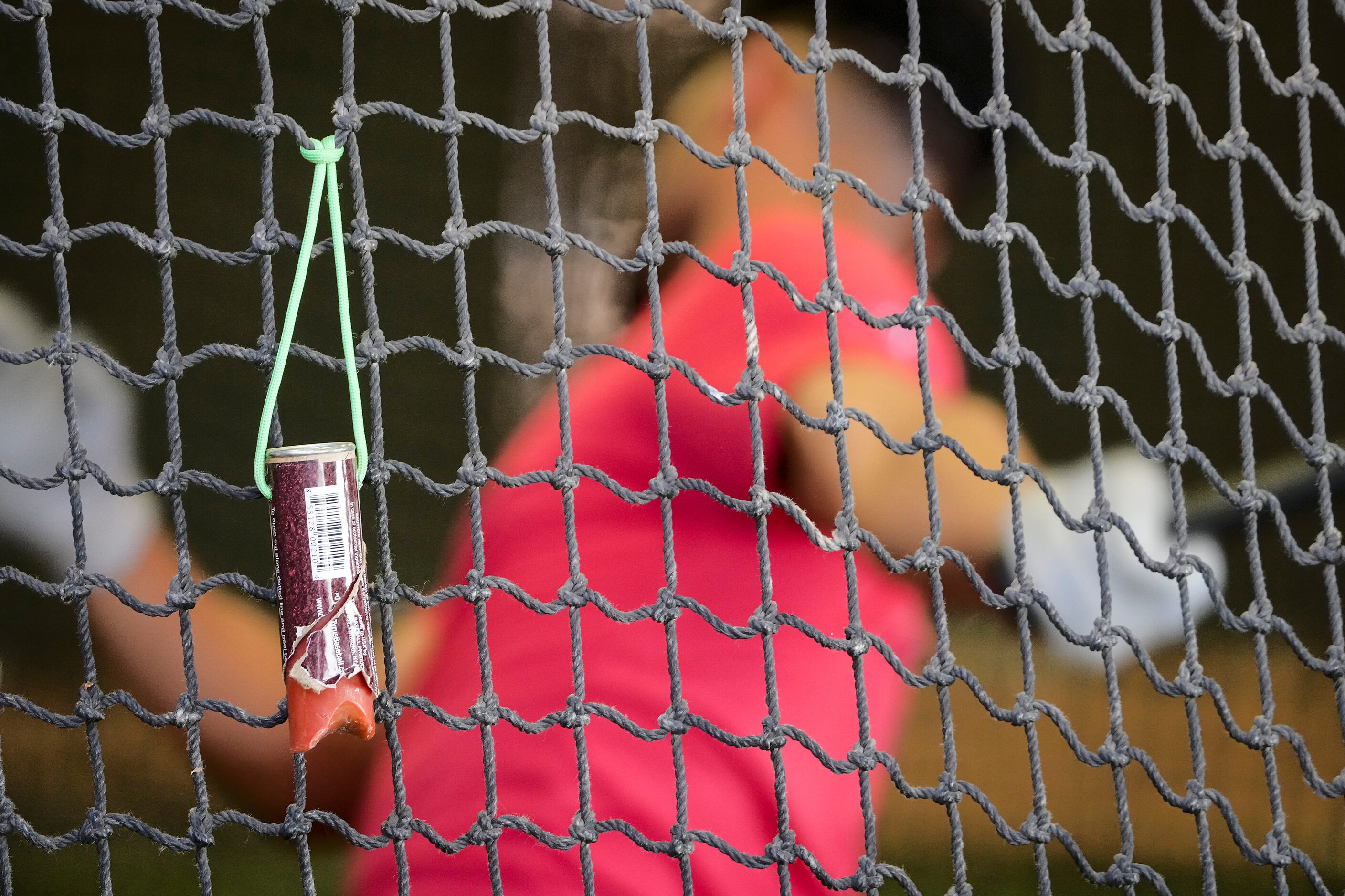 A pine tar stick hangs from the netting as Texas Rangers infielder Marcus Semien takes a...