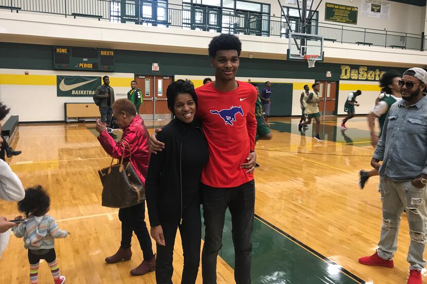 DeSoto's Feron Hunt, pictured here with his mother, Khadijah Edwards, signed with SMU on...