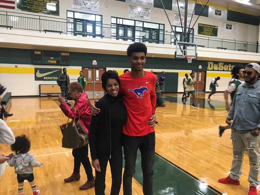 DeSoto's Feron Hunt, pictured here with his mother, Khadijah Edwards, signed with SMU on...