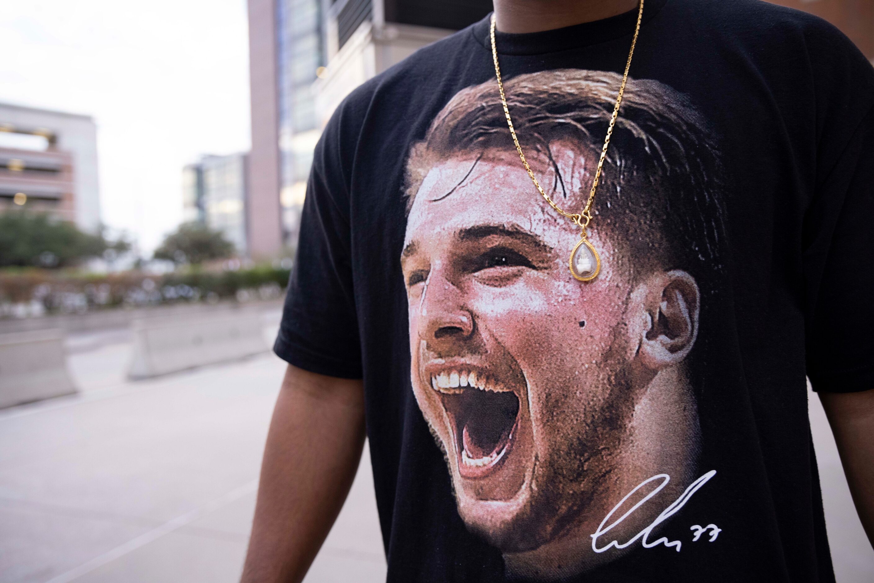 David Chay of Garland wears a Dallas Mavericks guard Luka Dončić (77) before the Dallas...