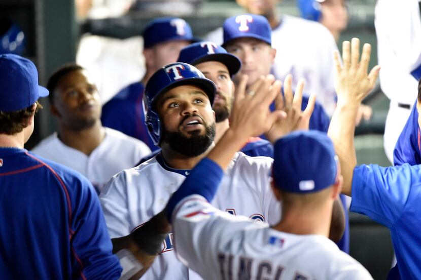 Texas Rangers designated hitter Prince Fielder (84) celebrates his solo home against the...