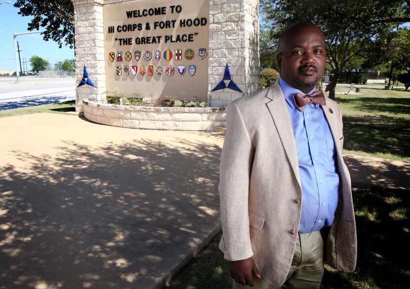 Riakos Adams, secretary of the Killeen chapter of the NAACP, poses outside Fort Hood on Aug....